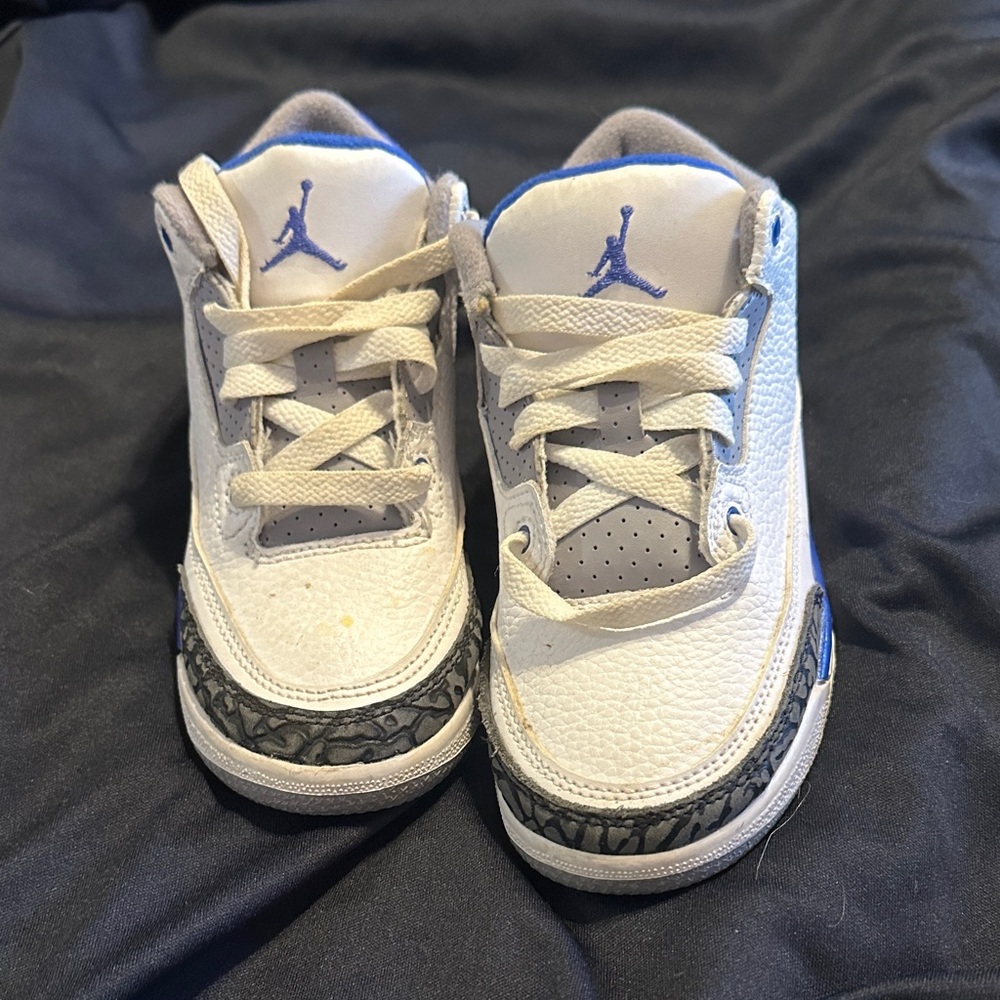 Kids Jordan White and Blue Sneakers